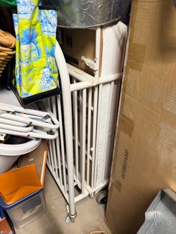 Portable white iron  crib.