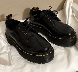 — Doc Marten’s Platform Lace-Up shoes.  Size: 7 Women’s . (Worn once lightly pretty much like new)..