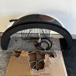 Outdoor fire pit kit includes protective metal ring, gas hose with propane tank, and burner ring