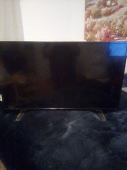 Flat Screen TV with Stand