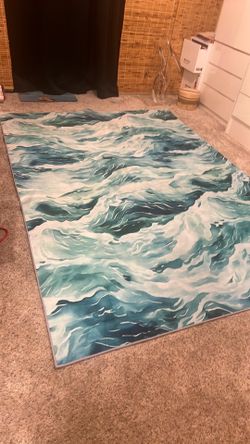 77” x 100” area rugs with rubber backing. Feel like cashmere and can be washed.