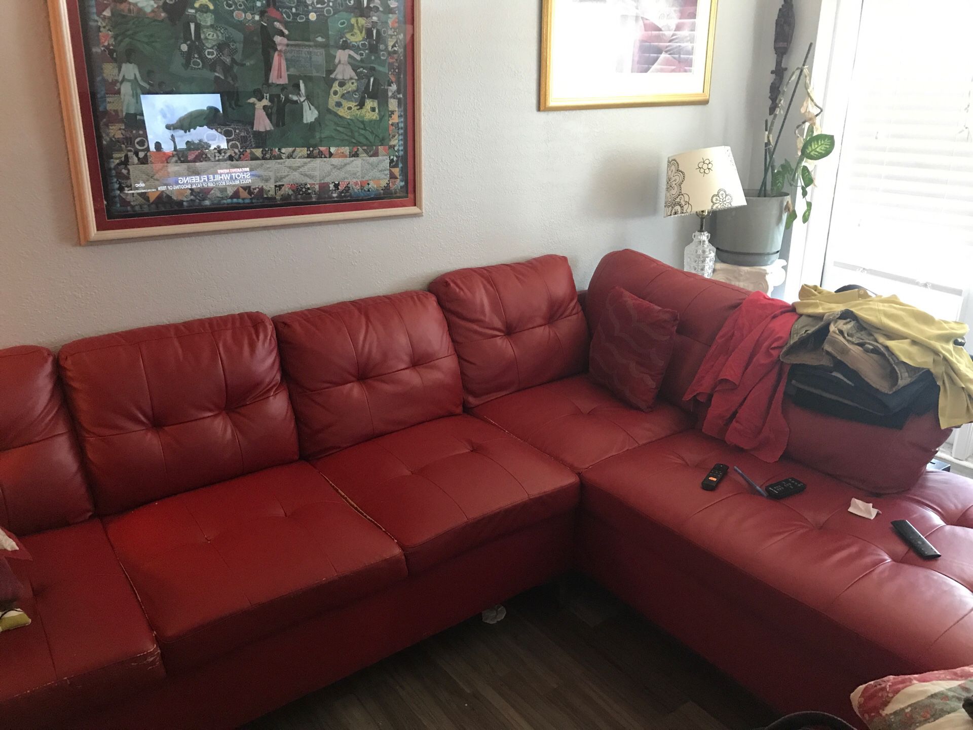 Free Red Sectional Must schedule a time for pick up because I have to reserve elevator