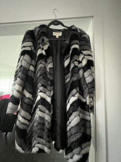 Black and white fur long jackets from Michael Kors