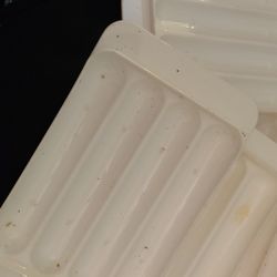 6 spiked white plastic microwave cooking dishes or trays for cooking hot dogs. East, west, north