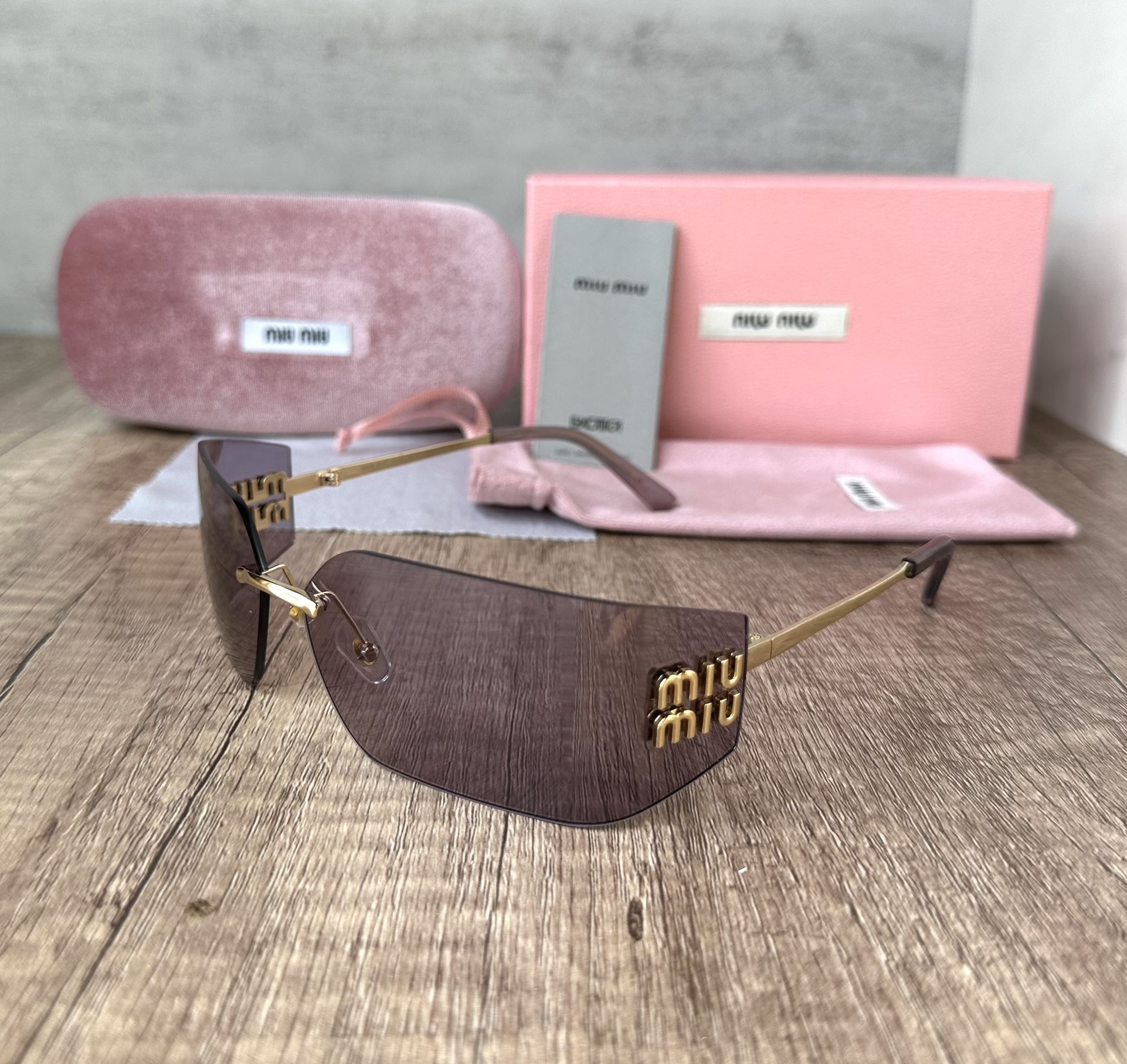 Miu Miu Sunglasses Purple Lens