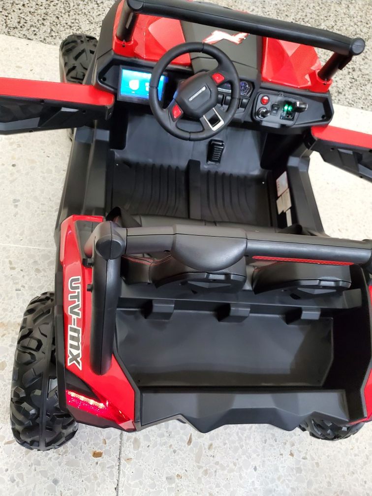 Utv 4x4 Remote control leather seats screen for videos shocks soft tires 6mph