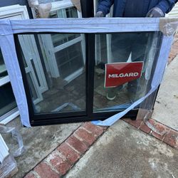 Window Brand new retrofit double glass vinyl  Milgard brand  Width 46 1/4 inches  Height 34 inches 