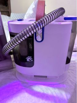 Portable carpet cleaner