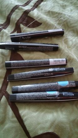 Assorted colors and types of mascaras Avon