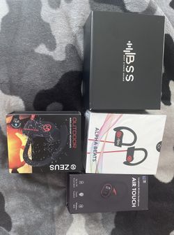 4 Pairs Of Headphones Never Used 