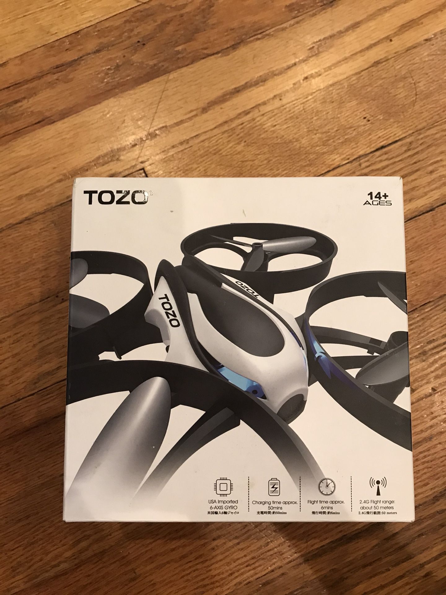 Tozo black and white stunt drone with 2 extra batteries