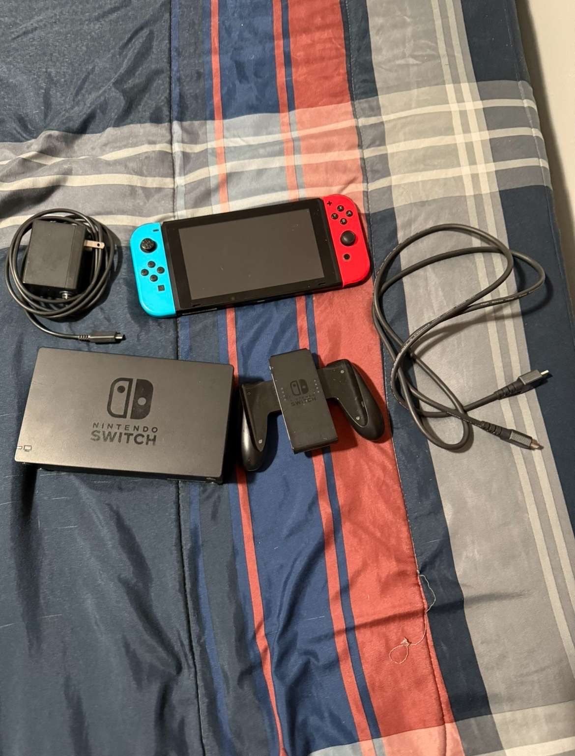 nintendo switch with mario kart and pro controller