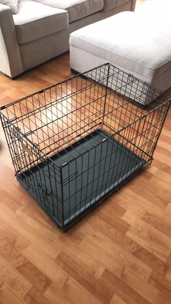 small to medium dog crate. 19x30x21 dimensions