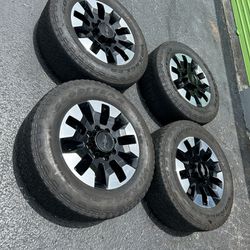 Chevy 2500 GMC factory rims 20 inch tires are low thread but they hold air 