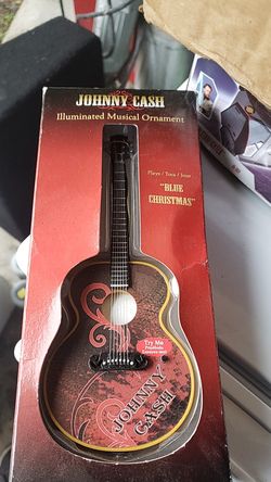 Singing Johnny cash mini guitar.