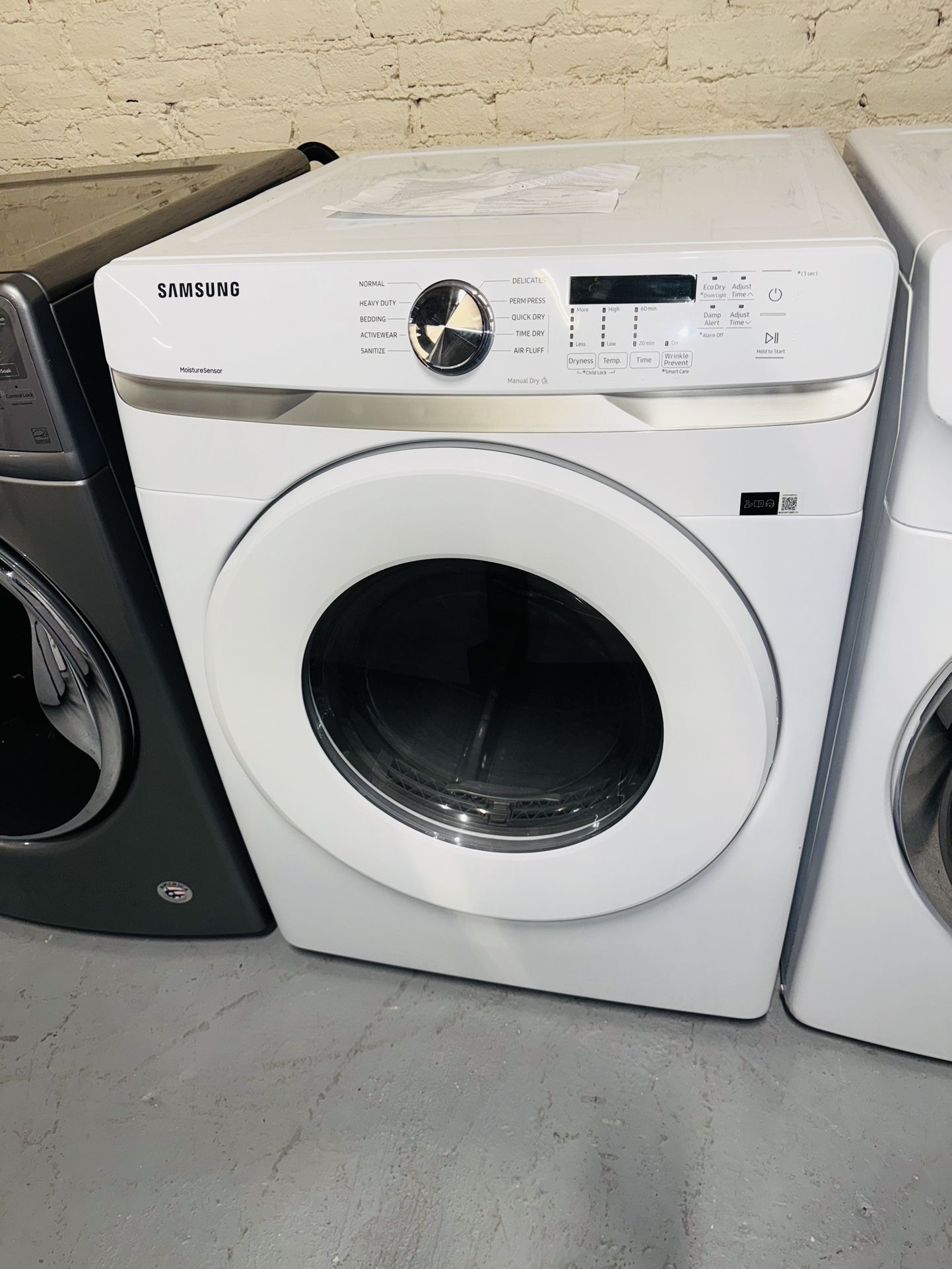 New Samsung gas dryer, a receipt for a 90-day warranty.