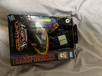 Transformers Legacy United Deluxe Class Armada Universe Wheeljack action figure.