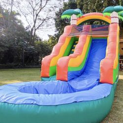 Brand New In Box - With a spectacular slide and splash pool, the Inflatable Jungle Slide is an eye-catcher. The jungle theme instantly guarantees a su
