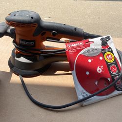 Sander Machine With New Box Of Sandpaper 