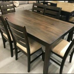 Rokane Brown Dining Table and Chairs (Set of 7) / 639