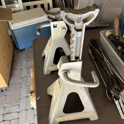 Floor jacks. Adjustable 10.00 for the pair