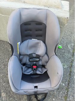 Evenflo Tribute LX convertible car seat in gray, featuring a 5-point harness system and a removable head pillow.