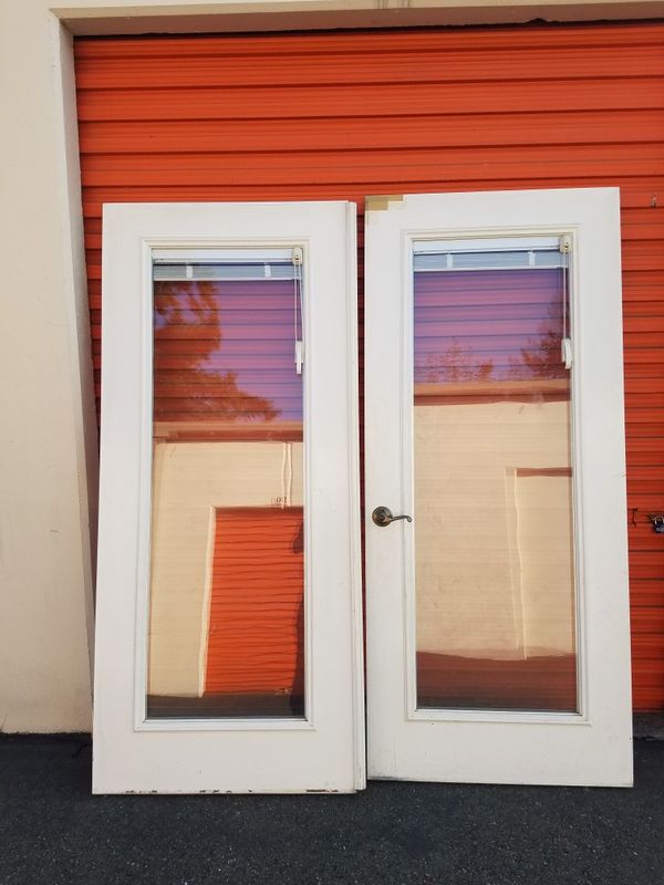 Insulated glass doors w/blinds. 34 x 78 inches each. No Insulated glass doors w/blinds. 34 x 78 inches each. No