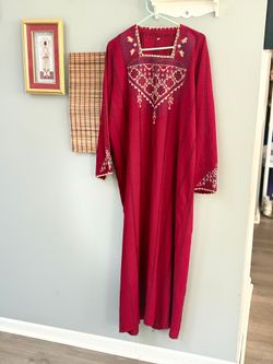LADIES ETHNIC KURTI OR A LONG TOP IN A RED EXTRA LARGE SIZE WITH EMBROIDERY ON THE CHEST AND SLEEVES