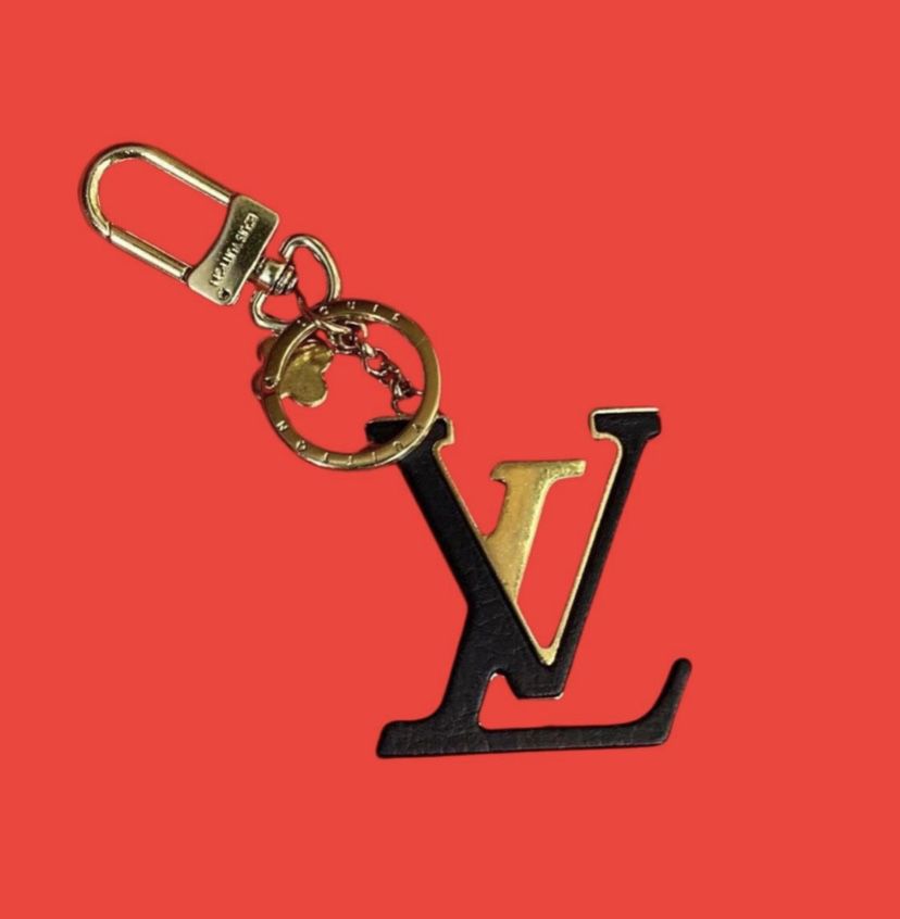 Authentic Louis Vuitton heavy gold/black Purse Charm keychain