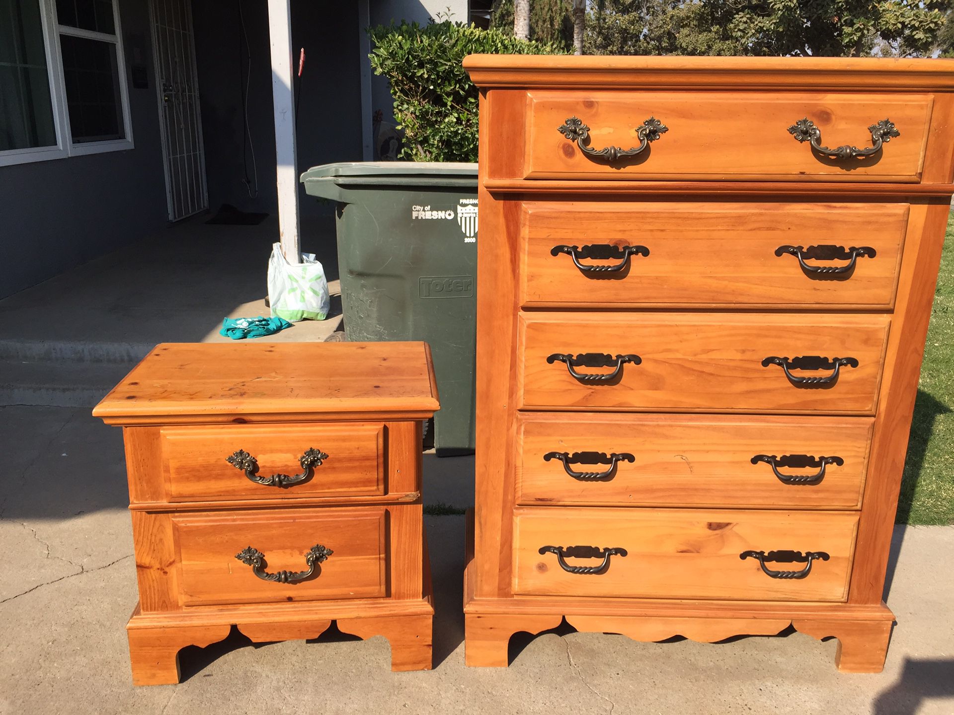 Tall dresser with five drawers and one night stand in good condition all drawers open fine.