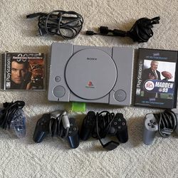 PlayStation with 2 Games 