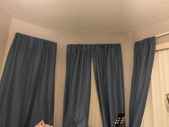 3 long blue curtains
