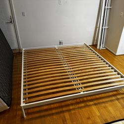 Two IKEA Vevelstad King Bed Frames