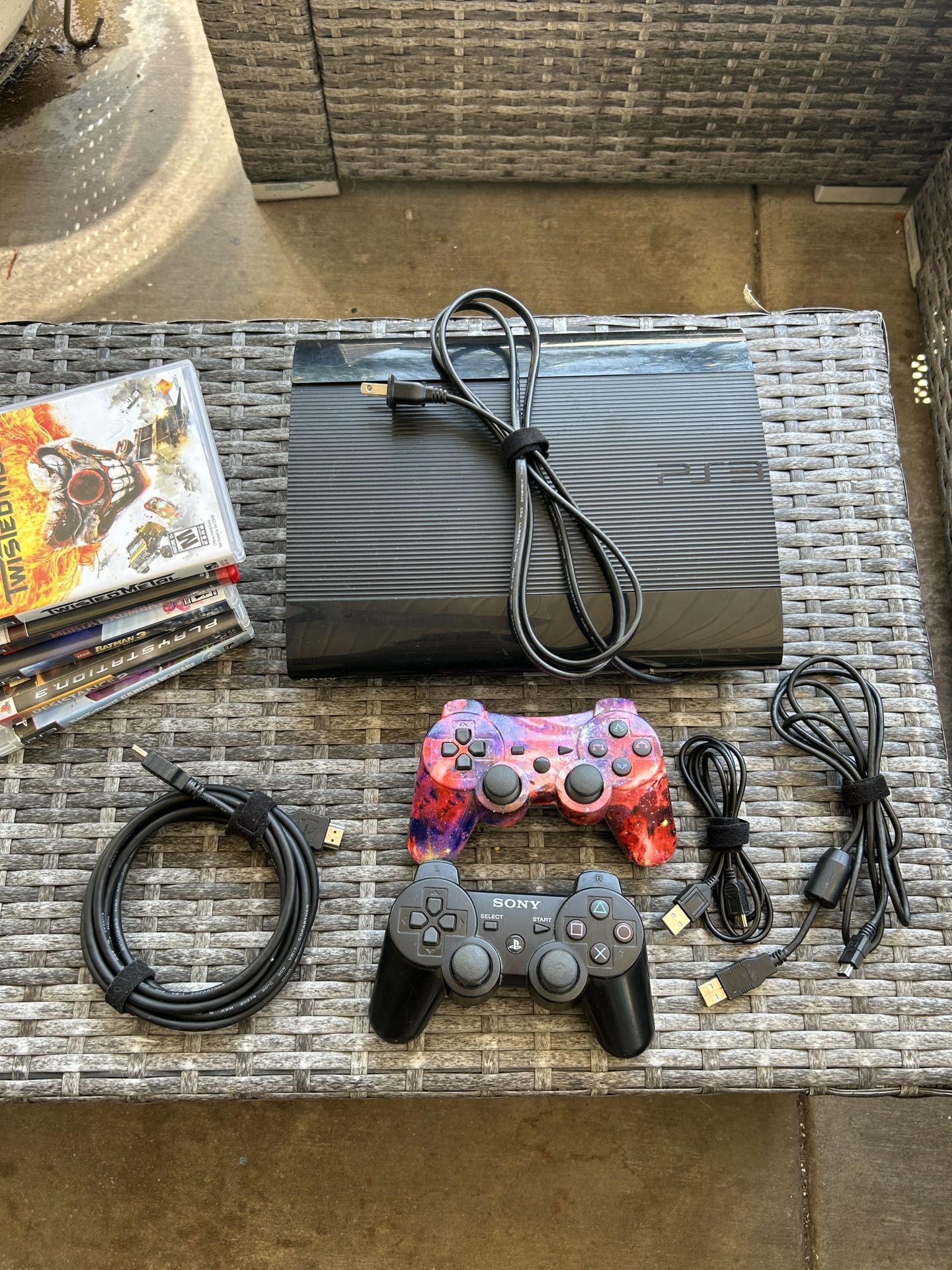 PS3 Super Slim Console 2 Controllers And Games