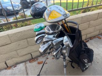 Titleist Golf Club Set with Stand Bag Irons are PING,driver is NIKE and a Mizuno 3 wood.