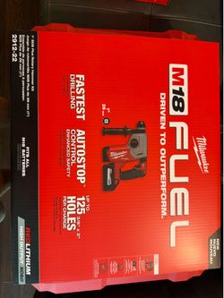 Milwaukee - Cordless Rotary Hammer Kit. Includes 2 batteries, rapid charger and case. Brand New