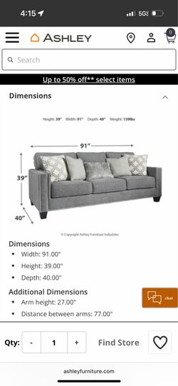 Gray Sofa couch with nailhead trim detail