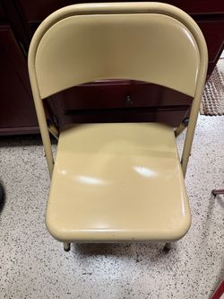 4 metal folding chairs