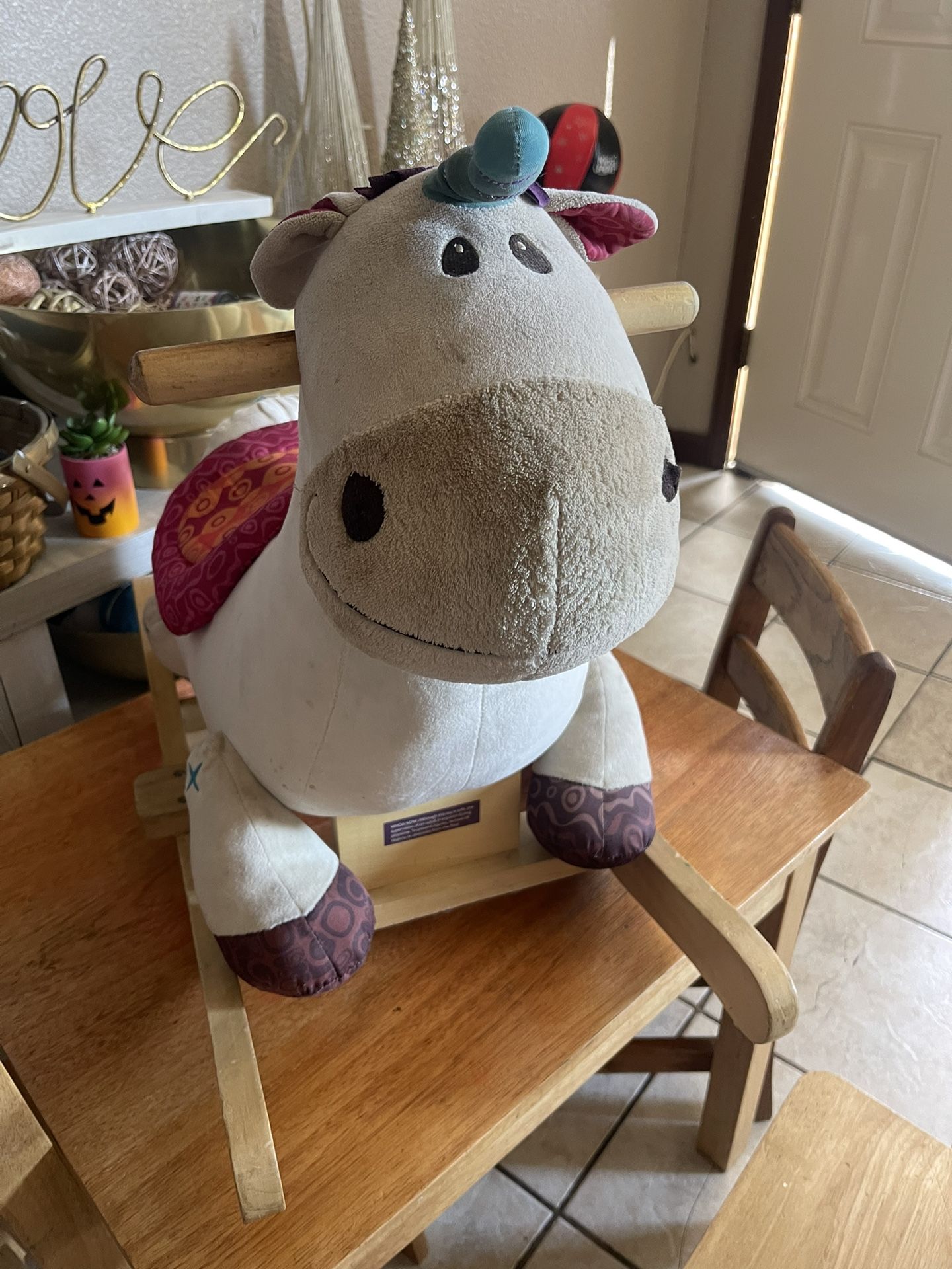 Toddler Riding Horse