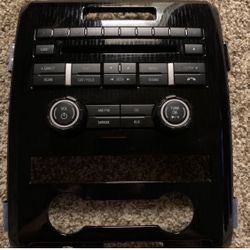 Fords F-150 09-14 am/fm cd trim plate