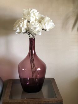 Big glass vase and flowers