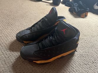 Size 10.5 Air Jordan 13 Black and Yellow Sneakers
