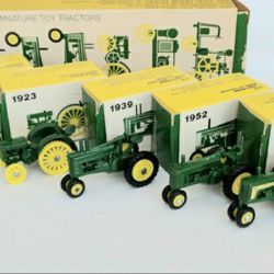 7 John Deere Miniature TOY tractors
