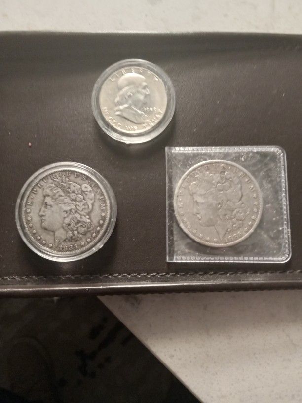 2-silver dollars , 1- silver .50c