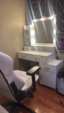 Vanity with drawers and adjustable lights