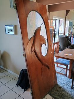 Solid wood dolphin door with leaded glass