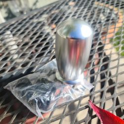 Weighted metal shift knob