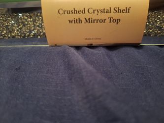 2 Crushed crystal shelves with mirror tops!