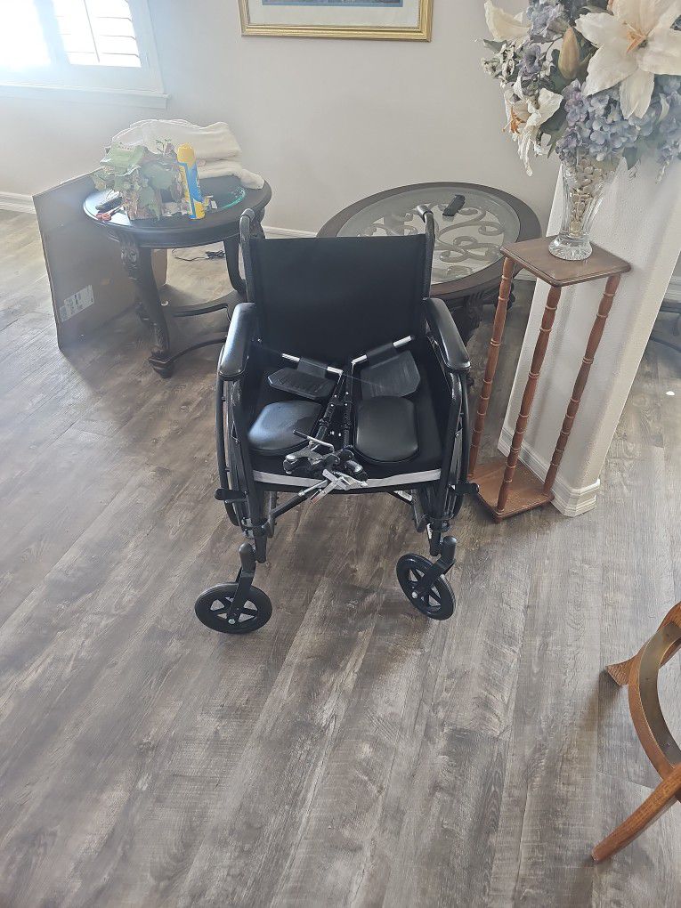 Midline Wheel Chair With Foot Pedals