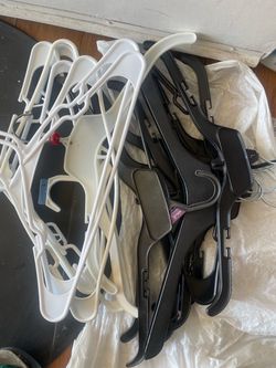 20 purses plastic hangers 10 pieces white color , 10 black color $1 /1